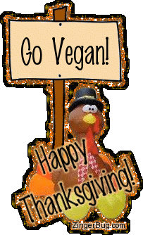 Cute glitter graphic of a turkey holding a sign that reads: Go Vegan! Comment reads: Happy Thanksgiving!