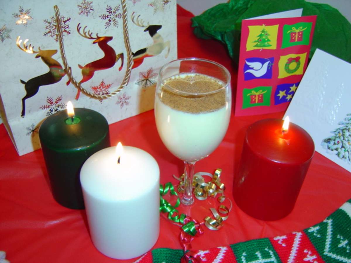 Click to get the codes for this image. Egg Nog With Candles And Presents, Holidays  Christmas Background, wallpaper or texture for Blogger, Wordpress, or any phone, desktop or blog.