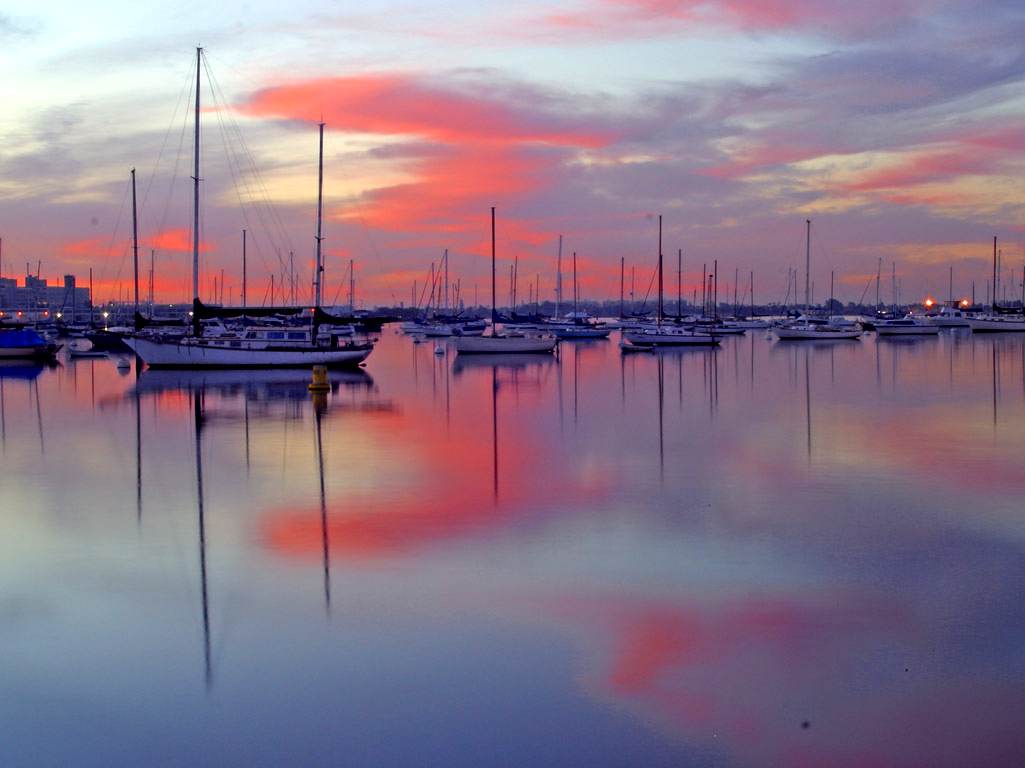 Click to get the codes for this image. Sailboats At Sunset, Cars Boats Trains etc, Sunsets and Sunrises, Ocean  Water Background, wallpaper or texture for any blog, web page, phone or desktop