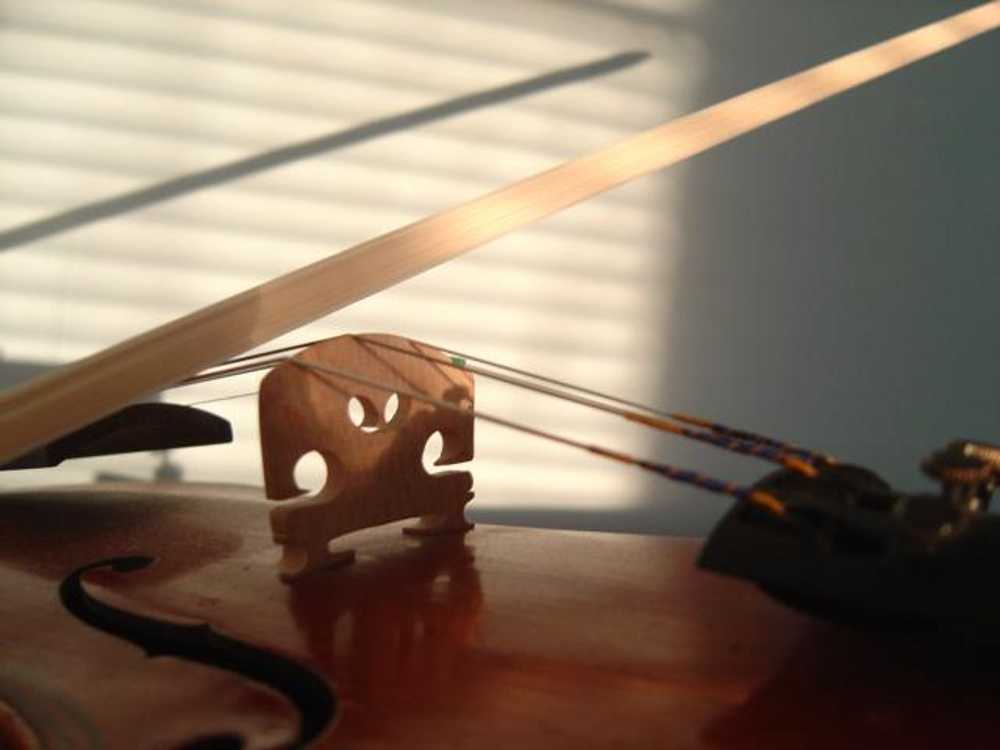 Click to get the codes for this image. Violin In Sunbeam Closeup, Music and Musical Instruments Background, wallpaper or texture for any blog, web page, phone or desktop