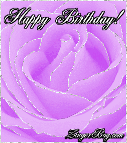 Click to get the codes for this image. This beautiful glitter graphic shows a close-up of a purple rose with silver glitter on the tips of each petal. The comment reads: Happy Birthday!