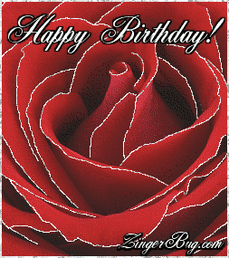 Click to get the codes for this image. This beautiful glitter graphic shows a close-up of a red rose with silver glitter on the tips of each petal. The comment reads: Happy Birthday!
