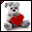 Click to get this Cursor. This cursor features a cute photo of a teddy bear holding a red heart.