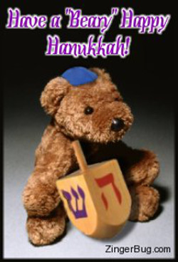 Click to get the codes for this image. Cute photo of a teddy bear wearing a blue yamaka and holding a wooden dradle. The comment reads: Have a Beary Happy Hanukkah!