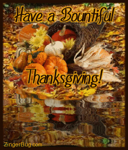 Click to get the codes for this image. This grpahic shows a horn of plenty on a slope of autumn leaves reflected in an animated pool. The comment reads: Have a Bountiful Thanksgiving!