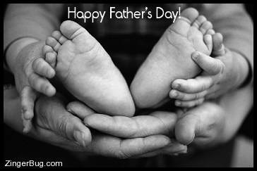 Click to get the codes for this image. This black and white photo shows a man holding a baby's feet in his hands. The comment reads: Happy Father's Day!