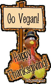 Click to get the codes for this image. Cute Thanksgiving glitter graphic of a cartoon turkey holding a sign that reads: Go Vegan!