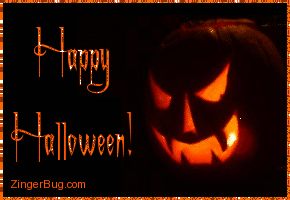 Click to get the codes for this image. Glitter graphic of a carved pumpkin with an animated glowing candle inside. The comment reads: Happy Halloween!